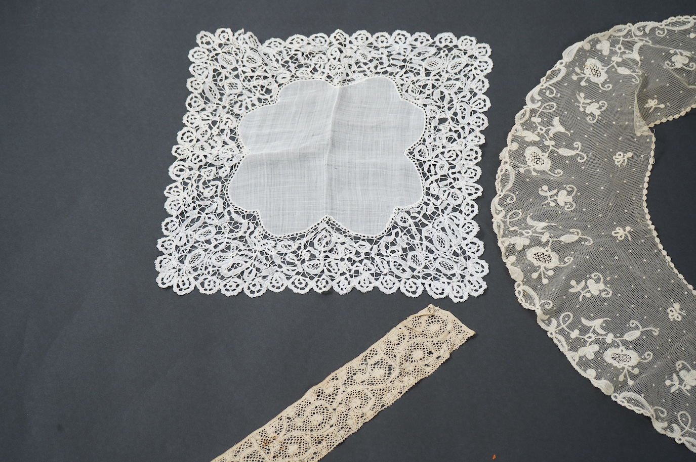 An early 19th bobbin lace length and a Brussels needle lace length, a Brussels bobbin lace wedding hankie and Brussels collar and length of trimming, a needle run collar and similar stole. (7). Brussels bobbin trim 250cm